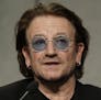 U2 rock band frontman Bono Vox talks to reporters during a press conference he held at the end of meeting with Pope Francis, at the Vatican, Wednesday