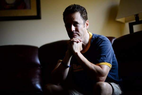 Because of his brain injury from a truck accident Mike Tomars needs to keep his St. Paul home dark. Excessive light causes him to have severe headache