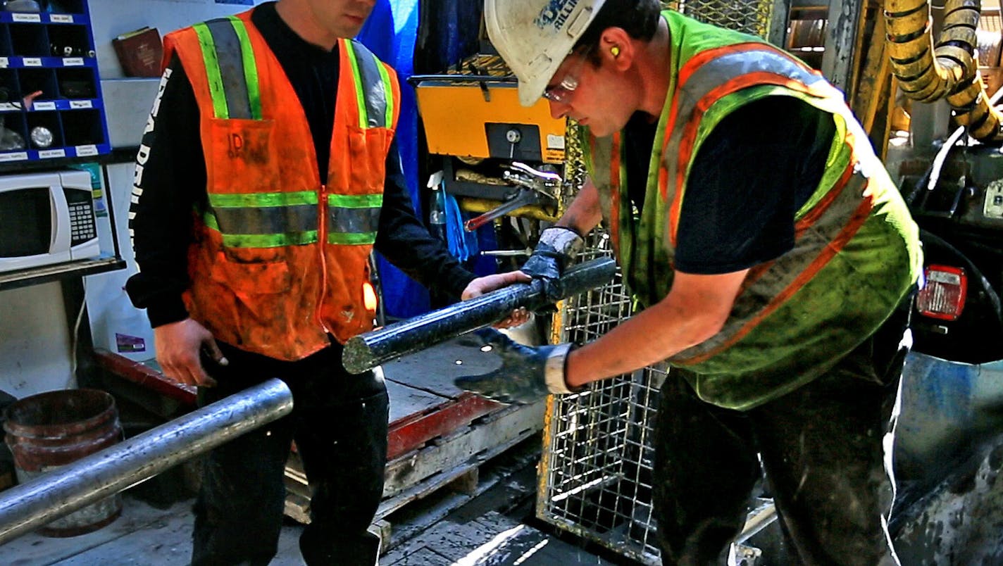 Not since the battle of 1978 to designate the BWCA as a wilderness area has the town of Ely been so divided. This time it's the possibility of Copper/Nickel mining and the promised jobs it brings -vs- the fear that mining so close to the BWCA could contaminate the water. Here, drillers for Twin Metals, at a site near the Kiwishiwi River, pull a core sample from the drill pipe. ] BRIAN PETERSON &#x2022; brianp@startribune.com ELY, MN - 05/30/2013 ORG XMIT: MIN1305310946521019 ORG XMIT: MIN1504142