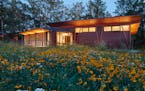 Set against a backdrop of rolling hills and prairie, SALA Architect's Home of the Month winning retreat is an restorative getaway in Frederic, Wis. th
