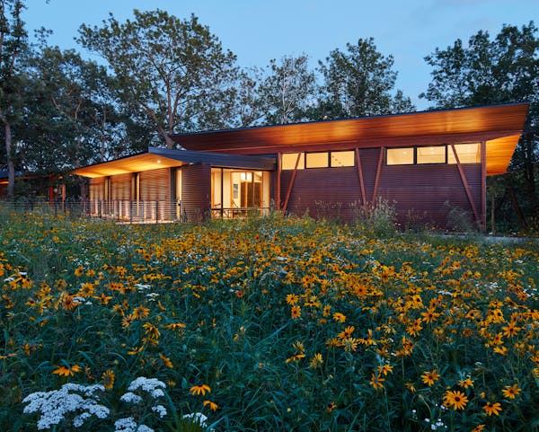 Set against a backdrop of rolling hills and prairie, SALA Architect's Home of the Month winning retreat is an restorative getaway in Frederic, Wis. th