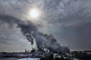 The early morning sun illuminated steam generated at the Pine Bend Refinery in Rosemount. There are plans for a $750 million investment in upgrades, t