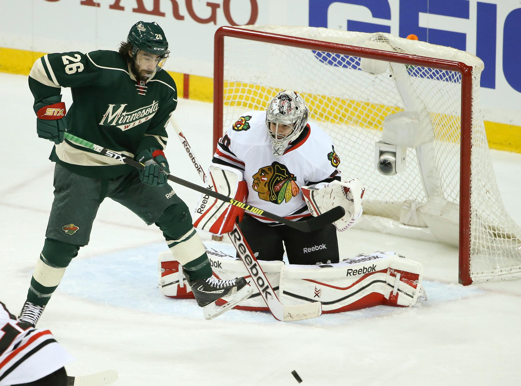 Minnesota Wild left wing Matt Moulson (26) tried to reach an incoming shot to tip it in the first period Tuesday night at Xcel Energy Center in St. Paul. ] JEFF WHEELER • jeff.wheeler@startribune.com The Minnesota Wild faced the Chicago Blackhawks in game 3 of their playoff series at Xcel Energy Center in St. Paul Monday night, May 6, 2014