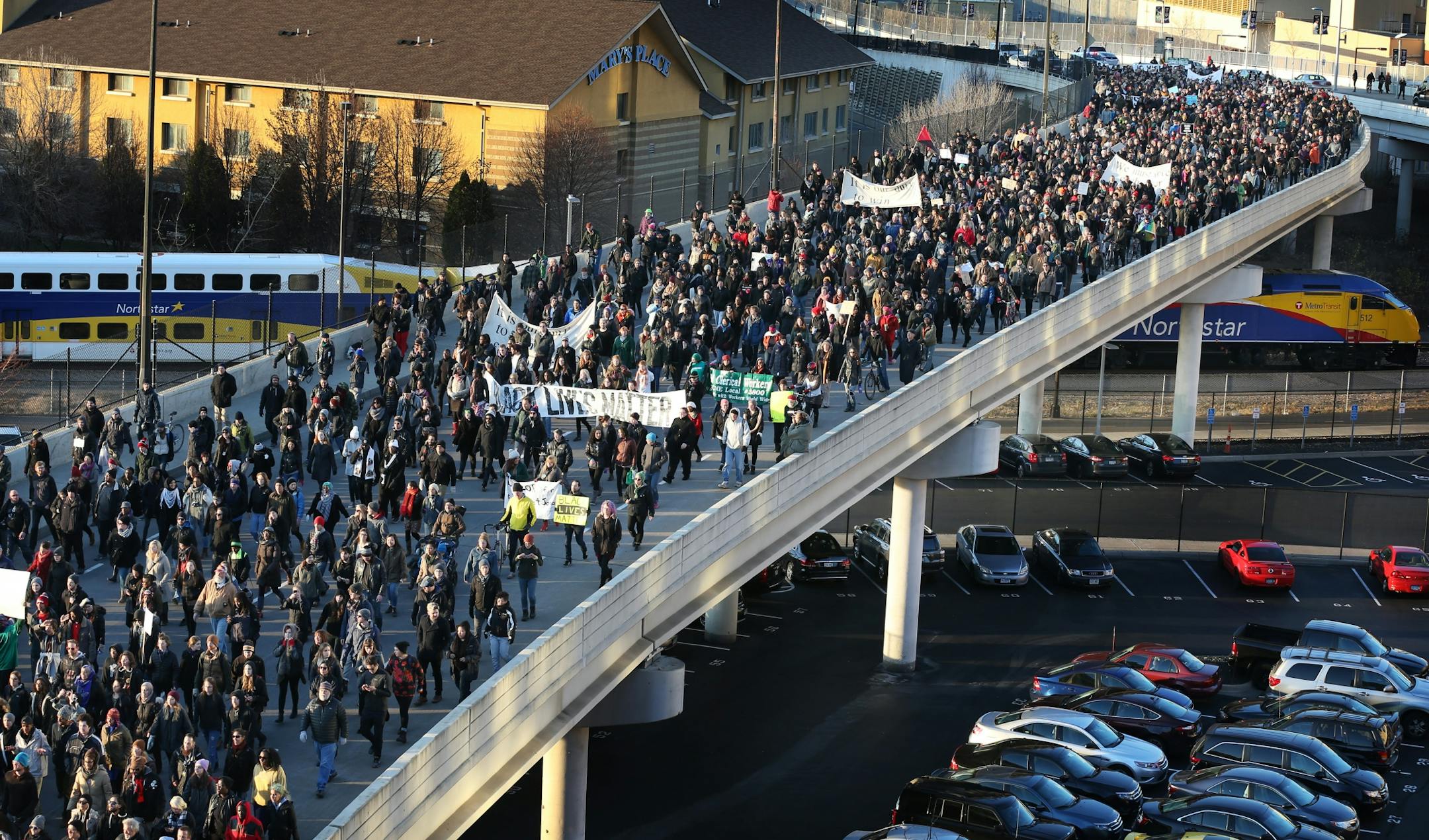 Members of the Black Lives Matters marched to protest the shooting of Jamar Clark down Seventh Street from the Fourth Precinct on Plymouth Avenue North Tuesday November 24 2015 in Minneapolis, MN.