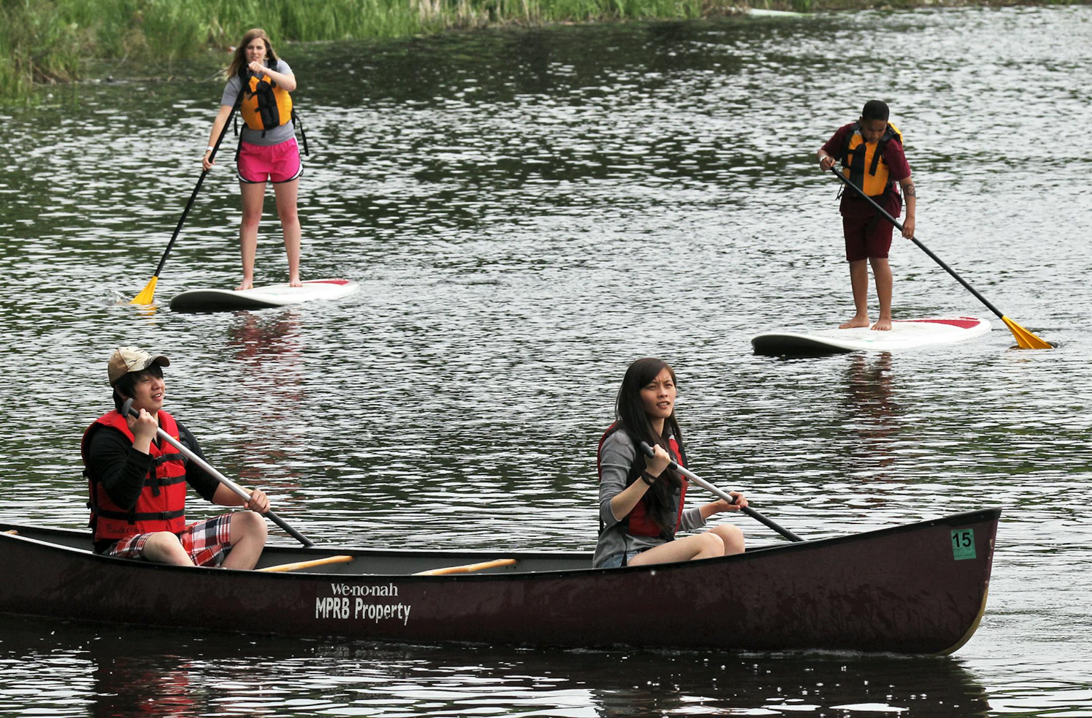 Minneapolis Park & Recreation Board, Minnesota DNR and REI hosted a National Get Outdoors Day event at Powderhorn Park in Minneapolis where a variety of outdoor activites were featured. Standup paddleboards and canoes were available for use on Powderhorn Lake. (MARLIN LEVISON/STARTRIBUNE(mlevison@startribune.com (cq )