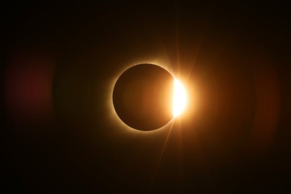 The moon passed in front of the sun for a total solar eclipse visible from Farmington, Mo.