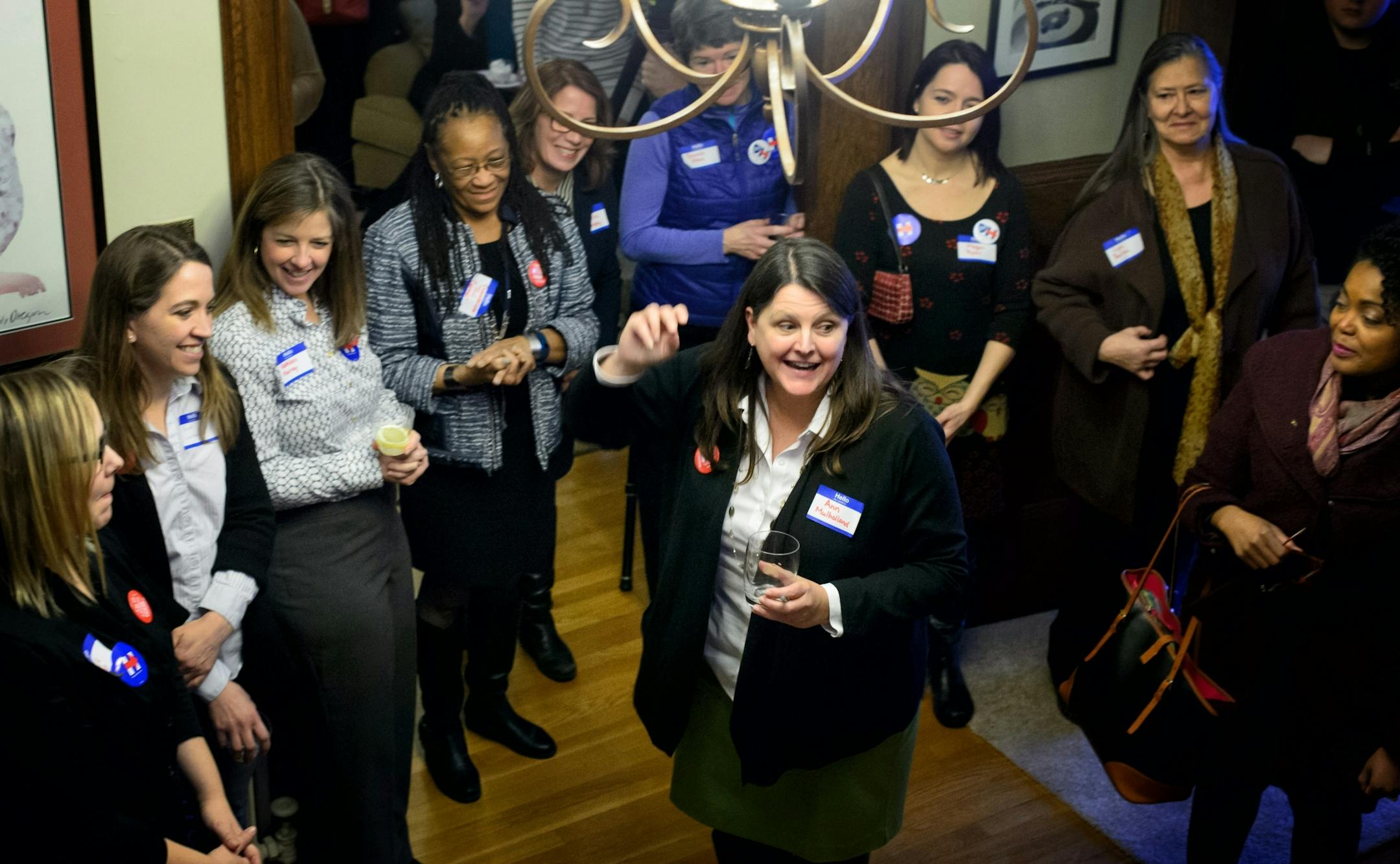 Ann Mulholland spoke to a group of mostly women at an organizing event at her St. Paul home.