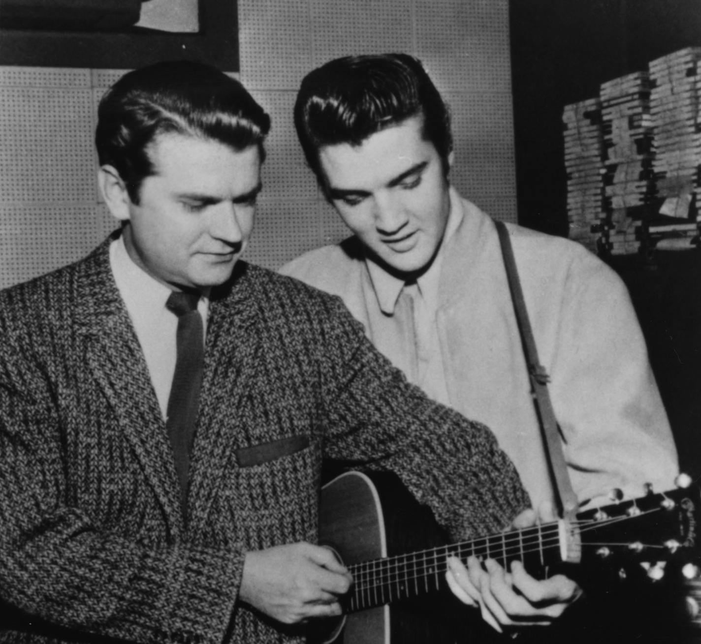 (left to right) music businessman Sam Phillips, and pop singer Elvis Presley. Photo courtesy of Sam Phillips, dated December 4, 1956.