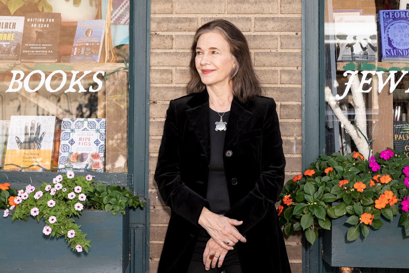 photo of Louise Erdrich, outside her Birchbark Books