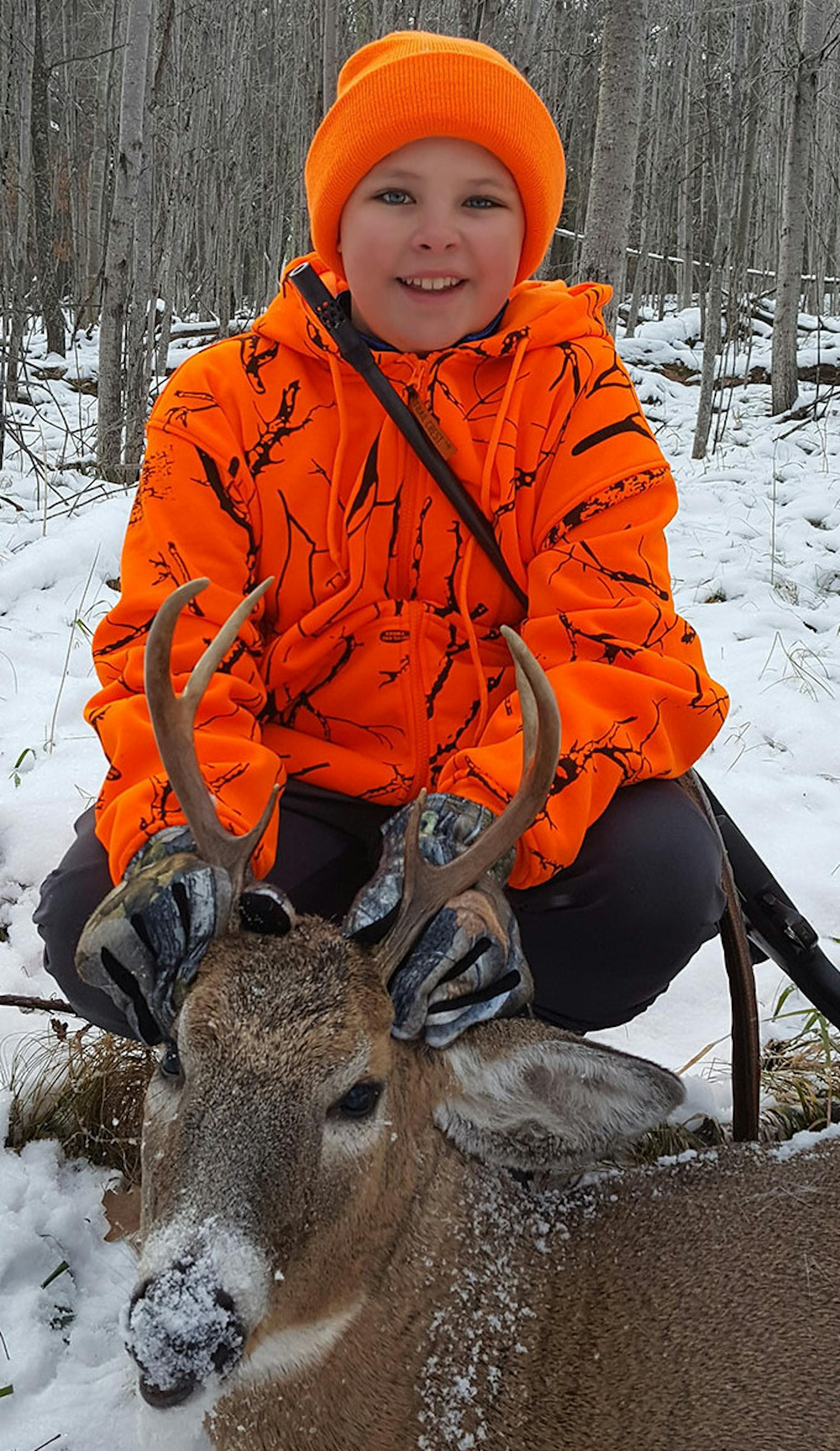 The deer gods smiled on Emmett Franzwa and he smiled back in a pose with this 8-pointer. The 13-year-old from Ramsey bagged the buck -- his first ever -- at his familyís cabin near Hackensack.