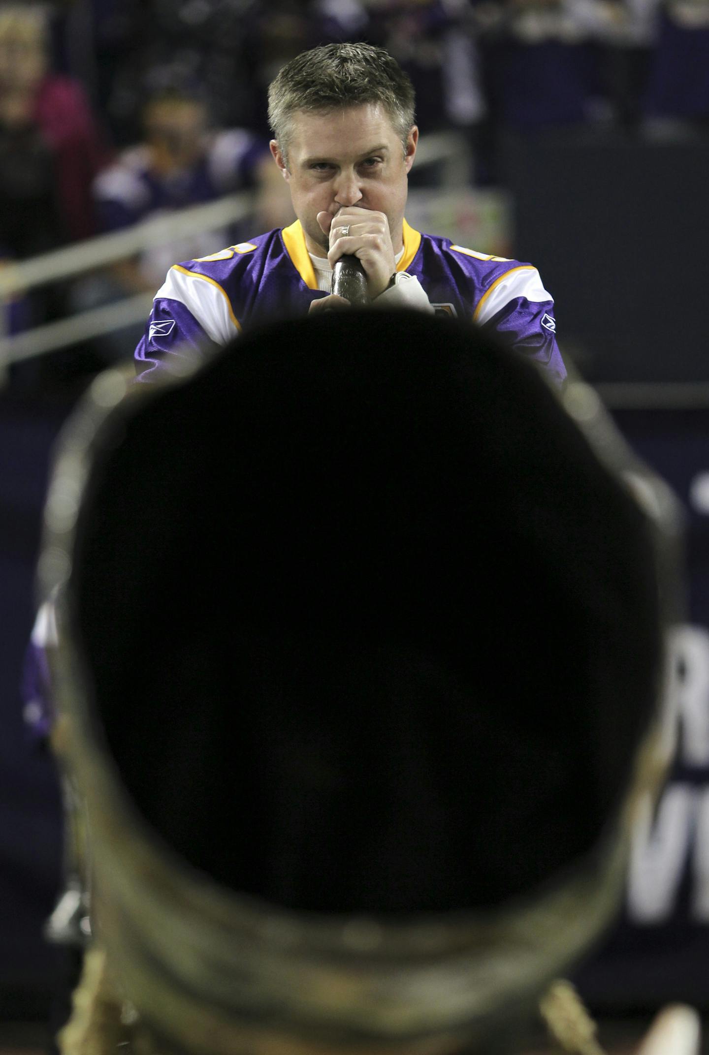 JEFF WHEELER ¥ jeff.wheeler@startribune.com MINNEAPOLIS - 10/17/10 - The Minnesota Vikings and the Dallas Cowboys met Sunday afternoon at the Metrodome in Minneapolis. IN THIS PHOTO: ] The Twins' Michael Cuddyer blew the giant horn before the Vikings game Sunday afternoon against the Cowboys.