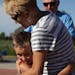 Hale Gulan,7, hugs his grandma, Millie Halden, after completing the Kid's Triathlon on Saturday morning at Lakeside Commons Park. ] Blaine hosted thei