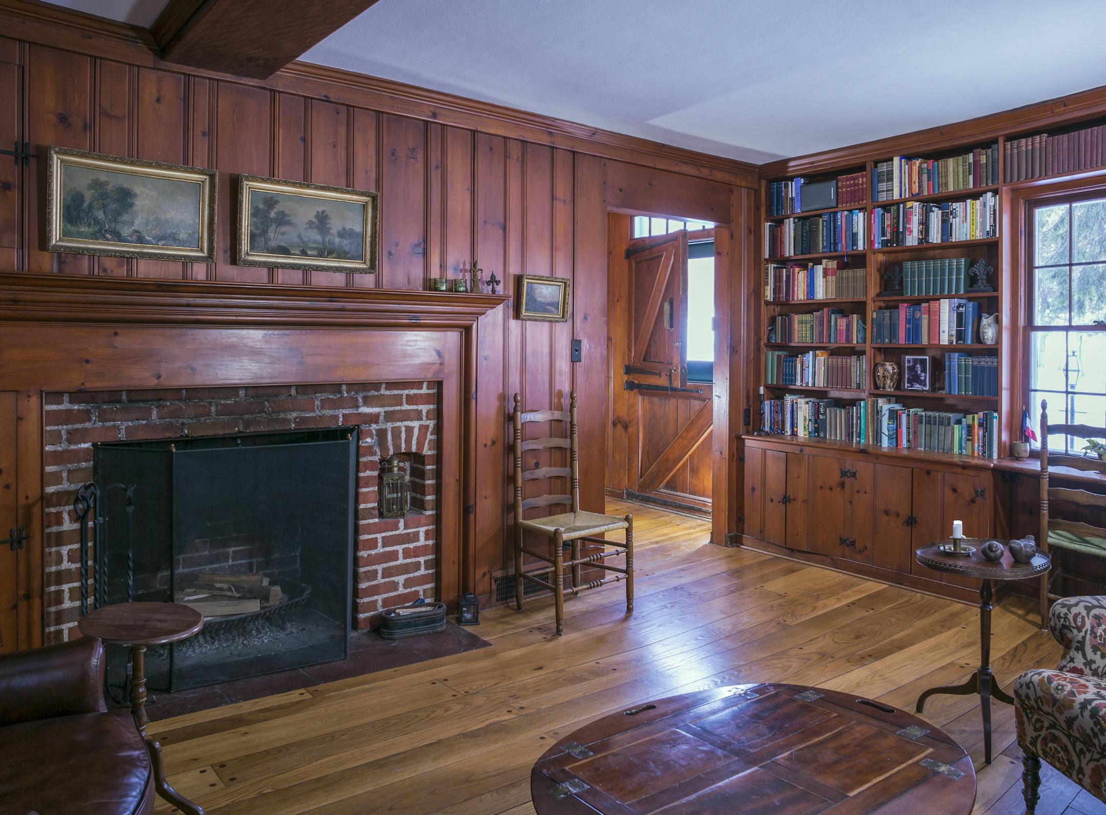 Author Peter OíToole in his Edwin Lundie-designed Cape Cod cottage in St. Paul. Buying his Edwin Lundie-designed house in 2003 ignited a fascination with the architect for Peter O'Toole, who just published a book about Lundie's work. Provided photo
