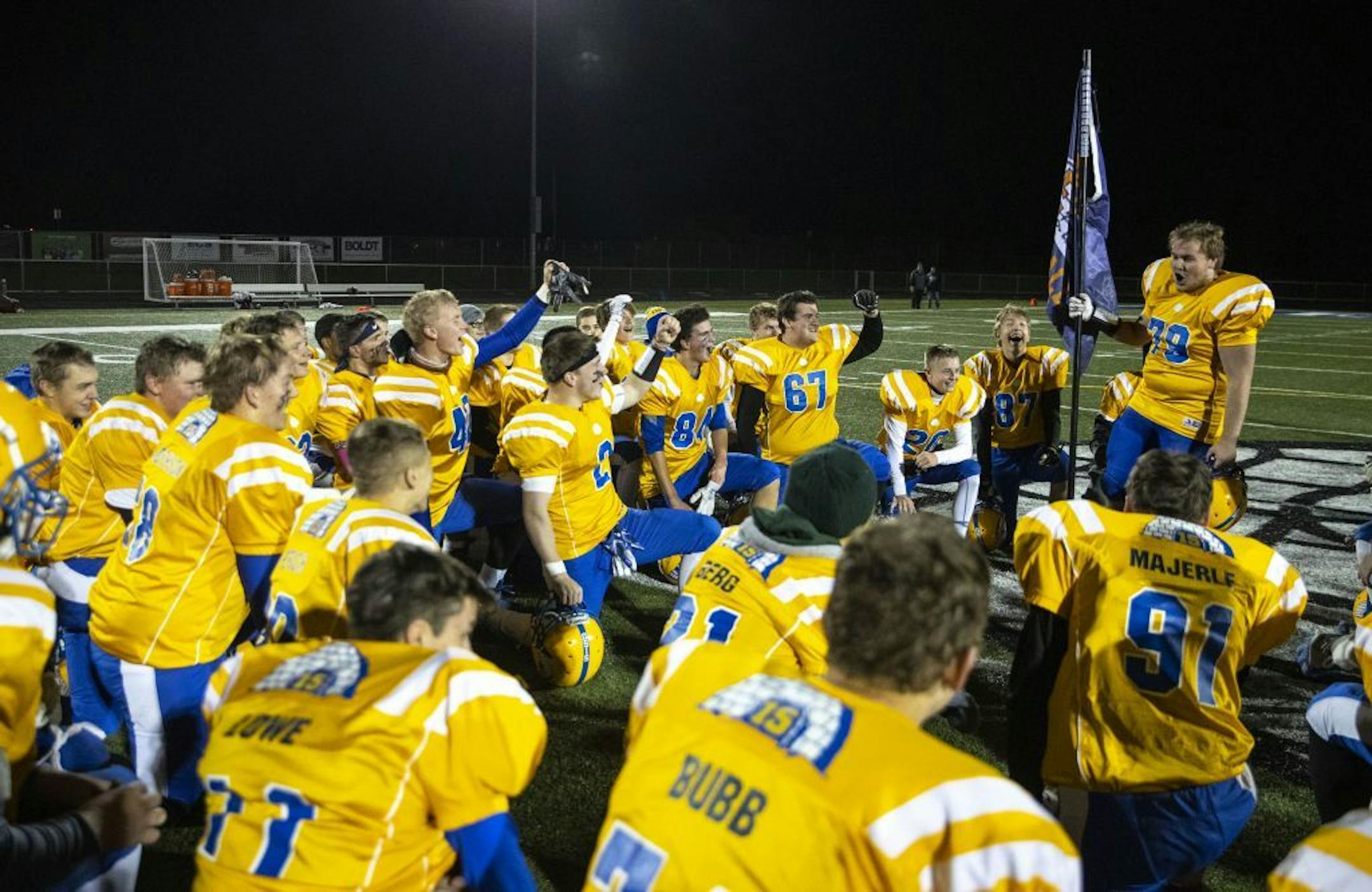 The Esko football team huddled up and celebrated its 33-0 victory over Crosby-Ironton.