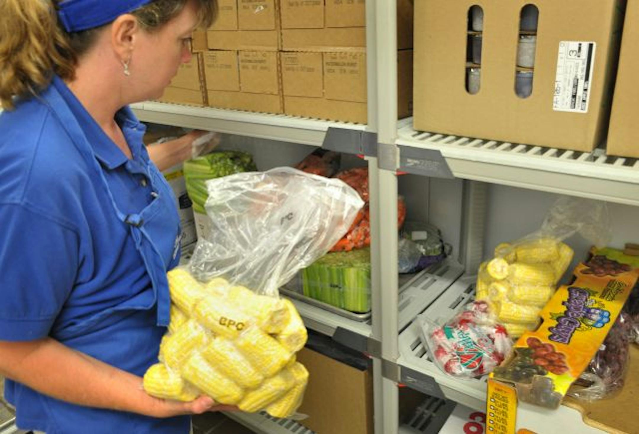 Vicki O'Brien, food manager at Kimberly Lane Elementary school, Plymouth served corn Friday from Axdahl Farms in Stillwater and Zyweic Farms in Cottage Grove.