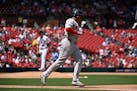Red Sox star Rafael Devers rounds first base after hitting a two-run homer off Cardinals relief pitcher Ryan Fernandez on Sunday in St. Louis.