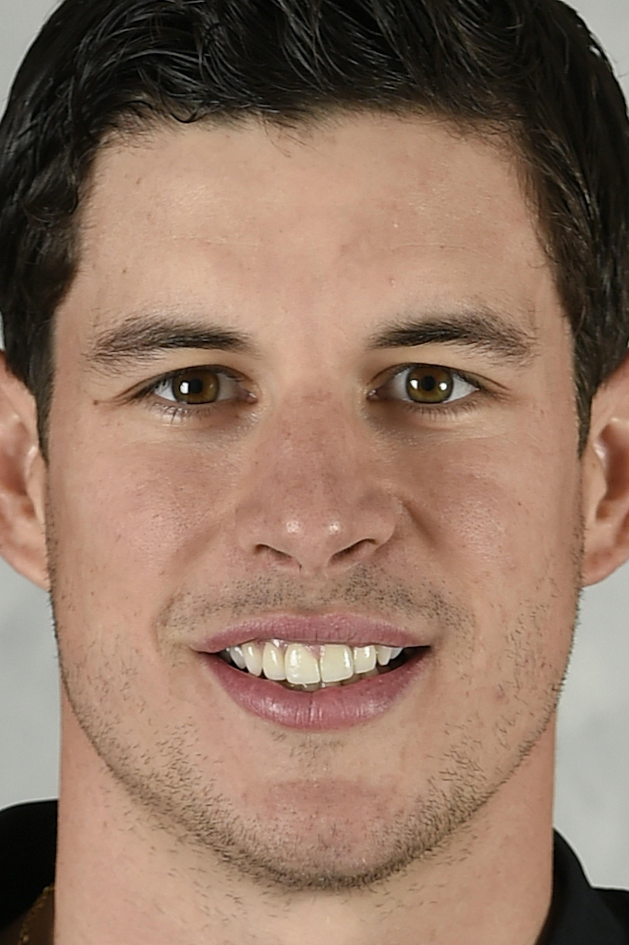 PITTSBURGH, PA - SEPTEMBER 17: Sidney Crosby #87 of the Pittsburgh Penguins poses for his official headshot for the 2014-2015 season on September 18, 2014 at the Consol Energy Center in Pittsburgh, Pennsylvania. (Photo by Joe Sargent/NHLI via Getty Images) ORG XMIT: 503032227