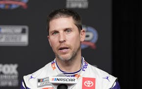 Denny Hamlin speaks during the NASCAR Daytona 500 media day in February.