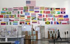 Amazon's Shakopee distribution center has 1,500 workers with ties to 64 countries. Flags in the entryway represent some of them.