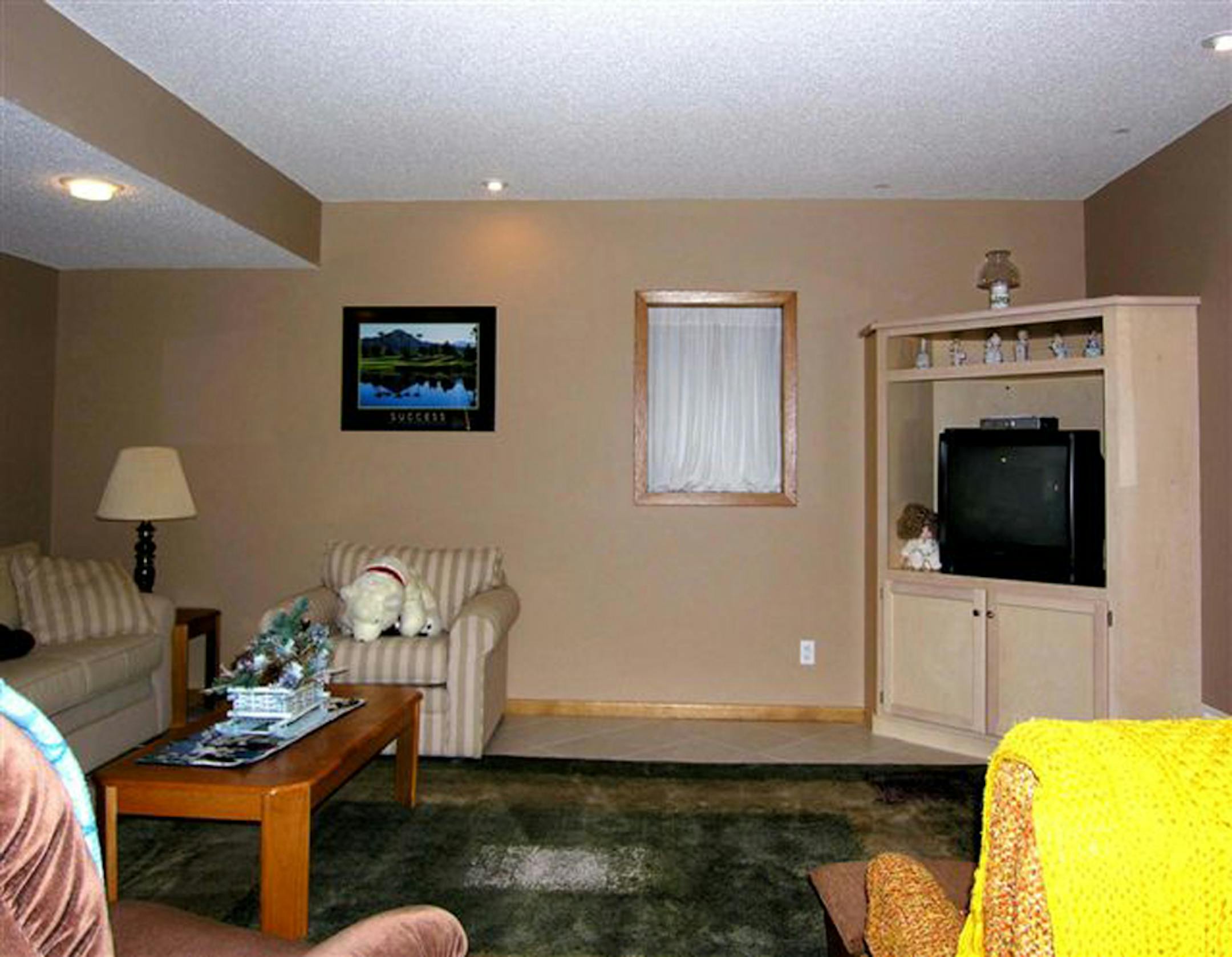 Before: A recliner blocked the entrance to the room and there were too many knick-knacks.