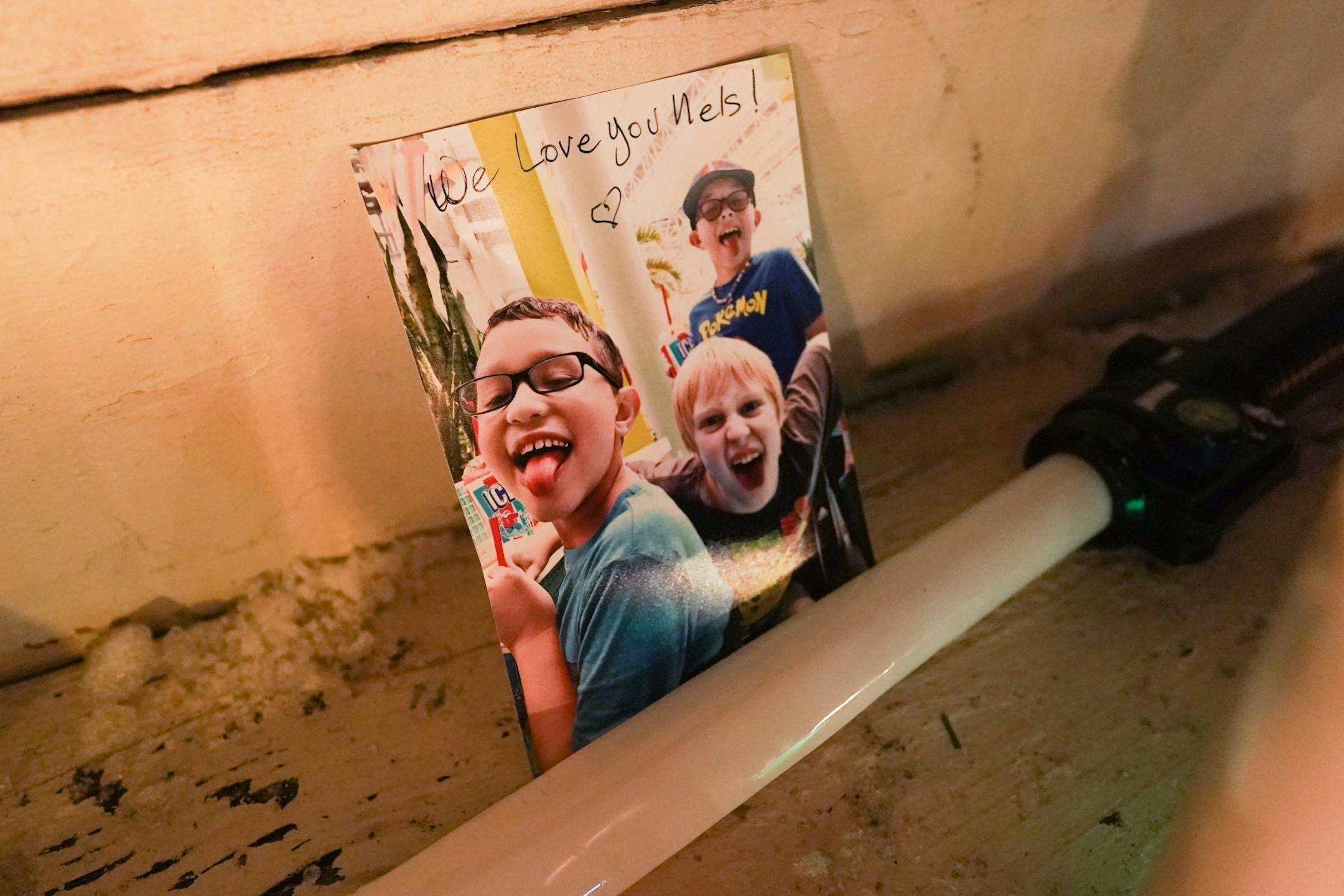 Stuffed animals, photos and light sabers were left on the steps of the home.