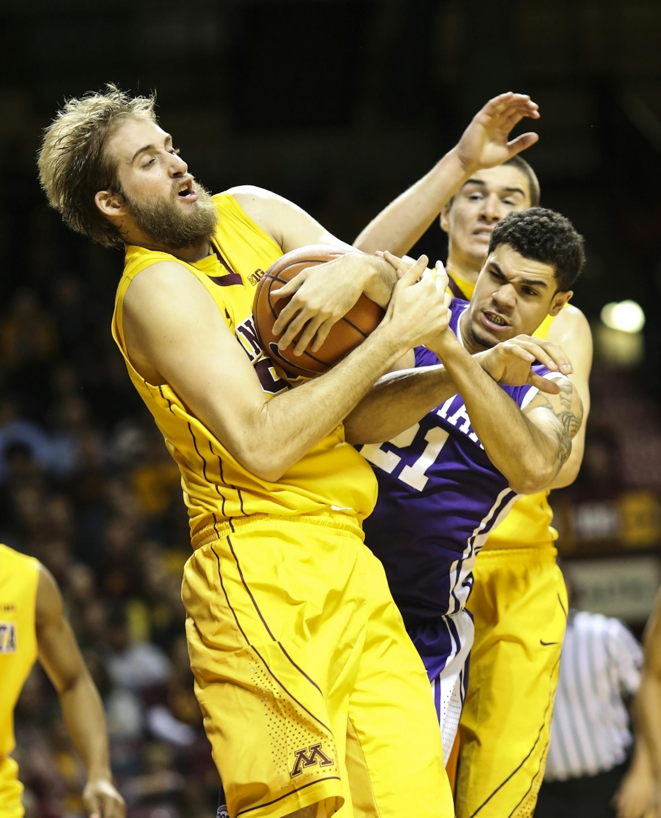 Gophers Elliot Eliason (left)