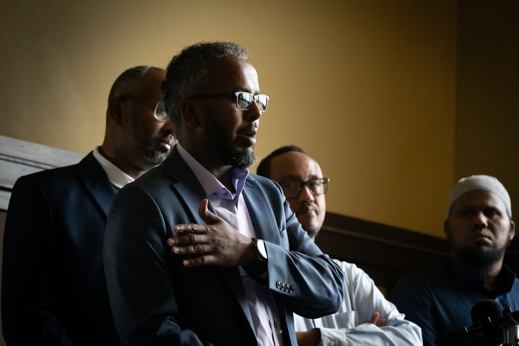 Osman Ahmed speaks at a Friday news conference in Minneapolis about his injuries sustained during an alleged hit-and-run attack.