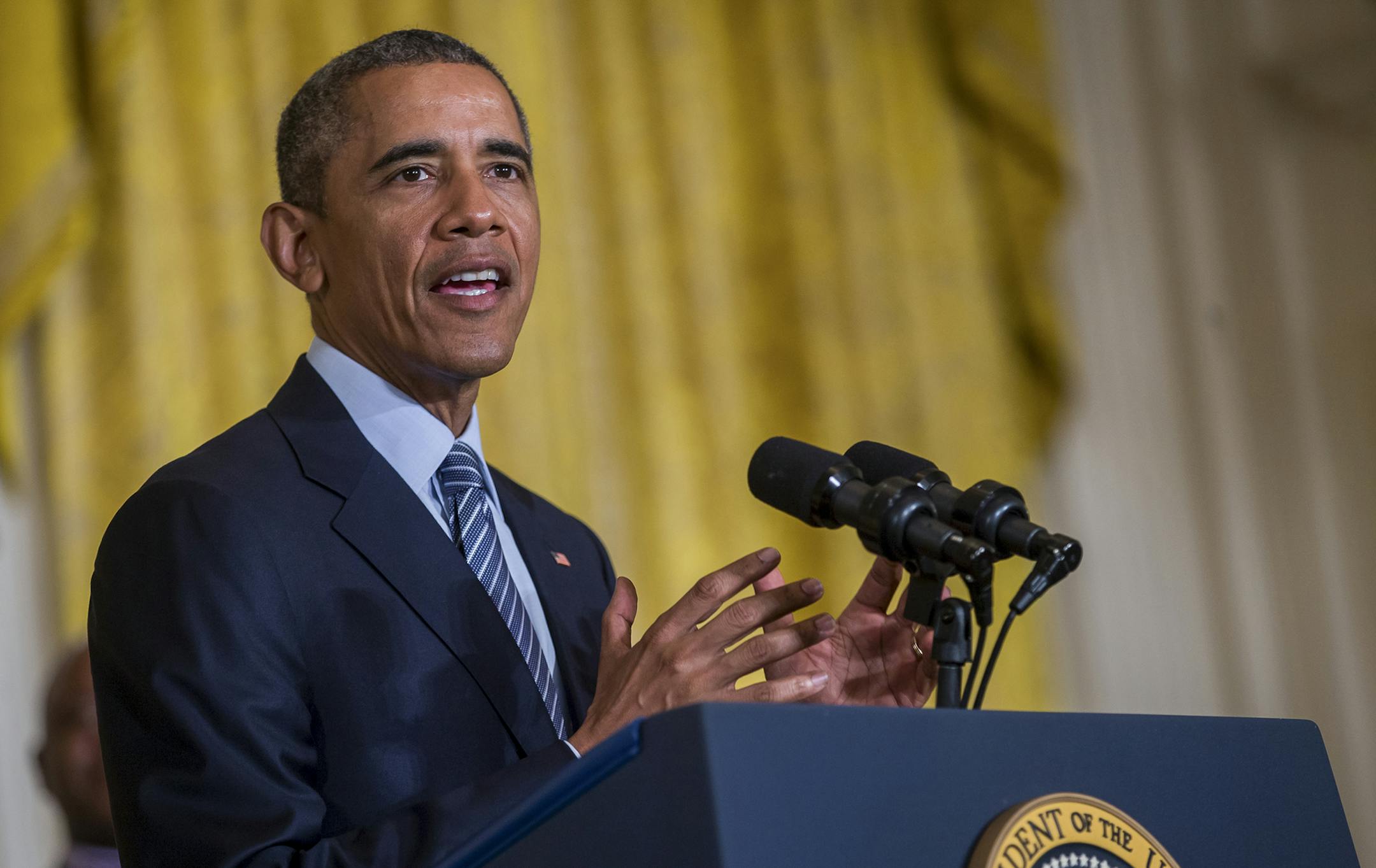 President Barack Obama discusses the Clean Power Plan in the East Room at the White House in Washington, Aug. 3, 2015. Obama unveiled a plan to reduce greenhouse gases on Monday requiring the nation's power plants to cut their carbon dioxide emissions to 32 percent below 2005 levels by 2030. (Zach Gibson/The New York Times) ORG XMIT: MIN2015080316323832