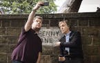 In this image released by CBS, Paul McCartney, right, joins host James Corden as they take a selfie on Penny Lane during the "Carpool Karaoke" segment