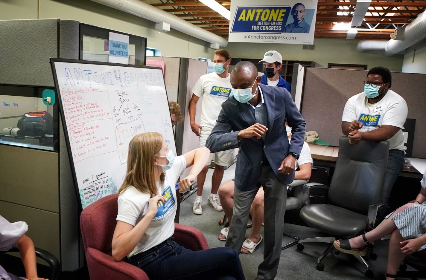 After the parking lot press conference where he predicted victory against incumbent U.S. Rep. Ilhan Omar, Antone Melton-Meaux entered his Minneapolis campaign headquarters and thanked staff members and volunteers for all their hard work. He elbow bumped all of them before leaving.