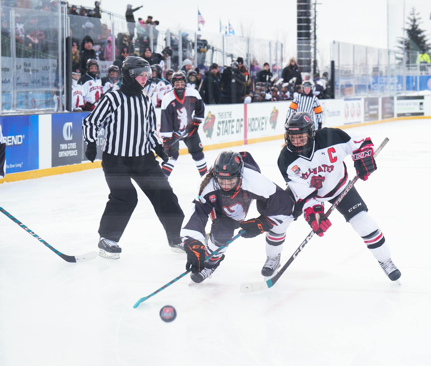 White Bear Lake forward Madelyn Lee,&nbsp;5, races Stillwater's Avery Braunshausen,&nbsp;2, to the puck on Hockey Day in Minnesota in White Bear Township, Minn., on Saturday, Jan. 28, 2023. Hockey Day Minnesota 2023 in White Bear Township. ] SHARI L. GROSS • shari.gross@startribune.com