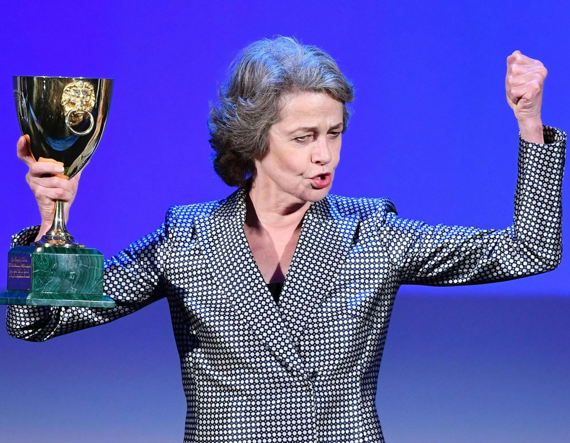 Actress Charlotte Rampling holds the Volpi Cup for best actress for her role in 'Hannah' during the award ceremony at the 74th annual Venice International Film Festival, in Venice, Italy, Saturday, Sept. 9, 2017. (Ettore Ferrari/ANSA via AP)