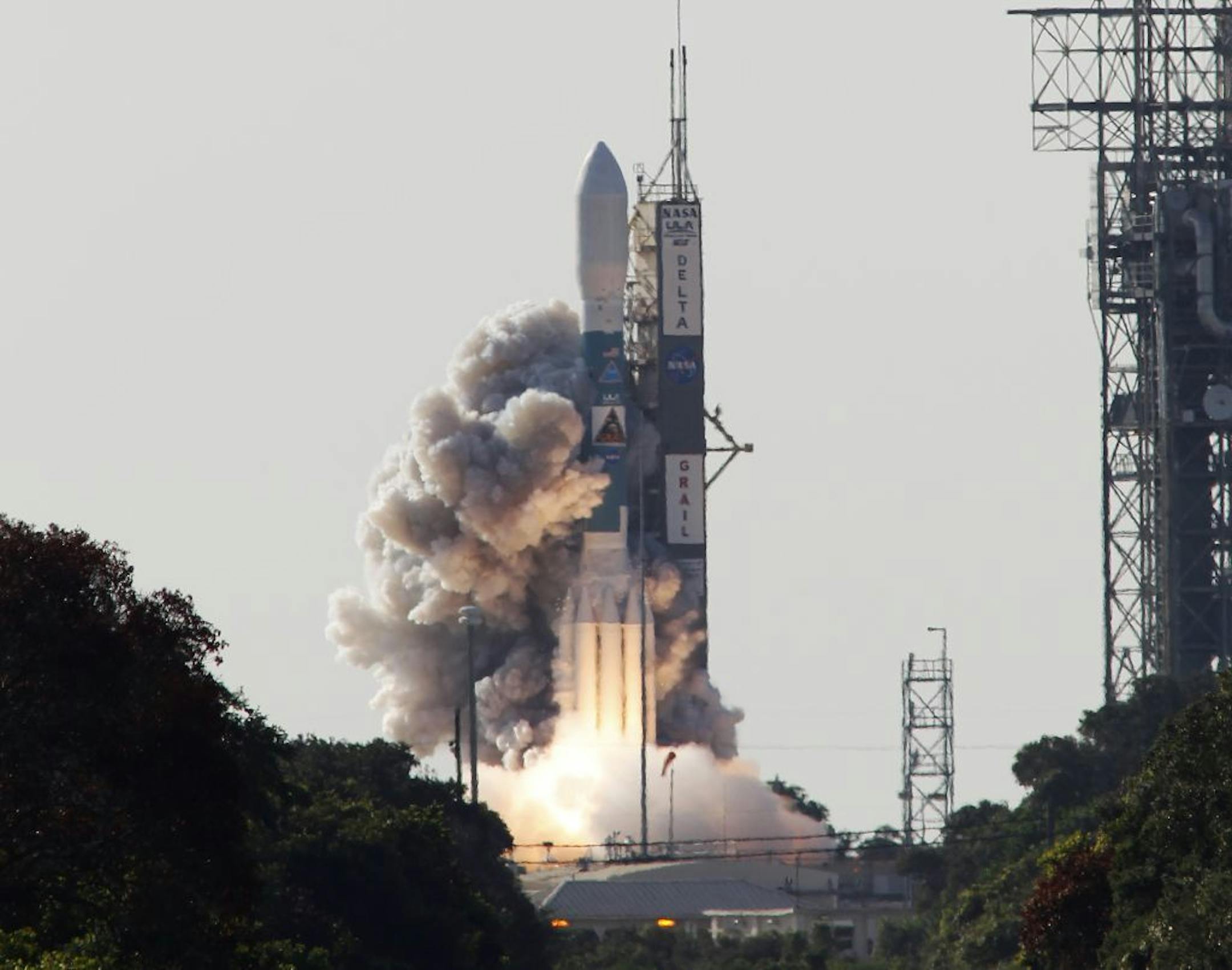 A Delta II rocket, the Gravity Recovery and Interior Laboratory (GRAIL) mission lifts off from the Cape Canaveral Air Force Station bound for the moon, in Cape Canaveral, Fla., Saturday, Sept. 10, 2011. It is the first mission dedicated to measuring lunar gravity and determining what's inside Earth's orbiting companion, all the way down to the core.