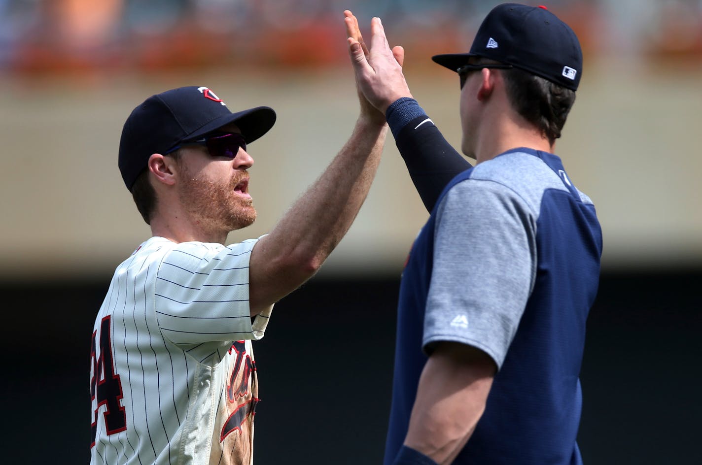 Logan Forsythe, left, had three RBI in the Twins' 6-4 victory over the Pirates.