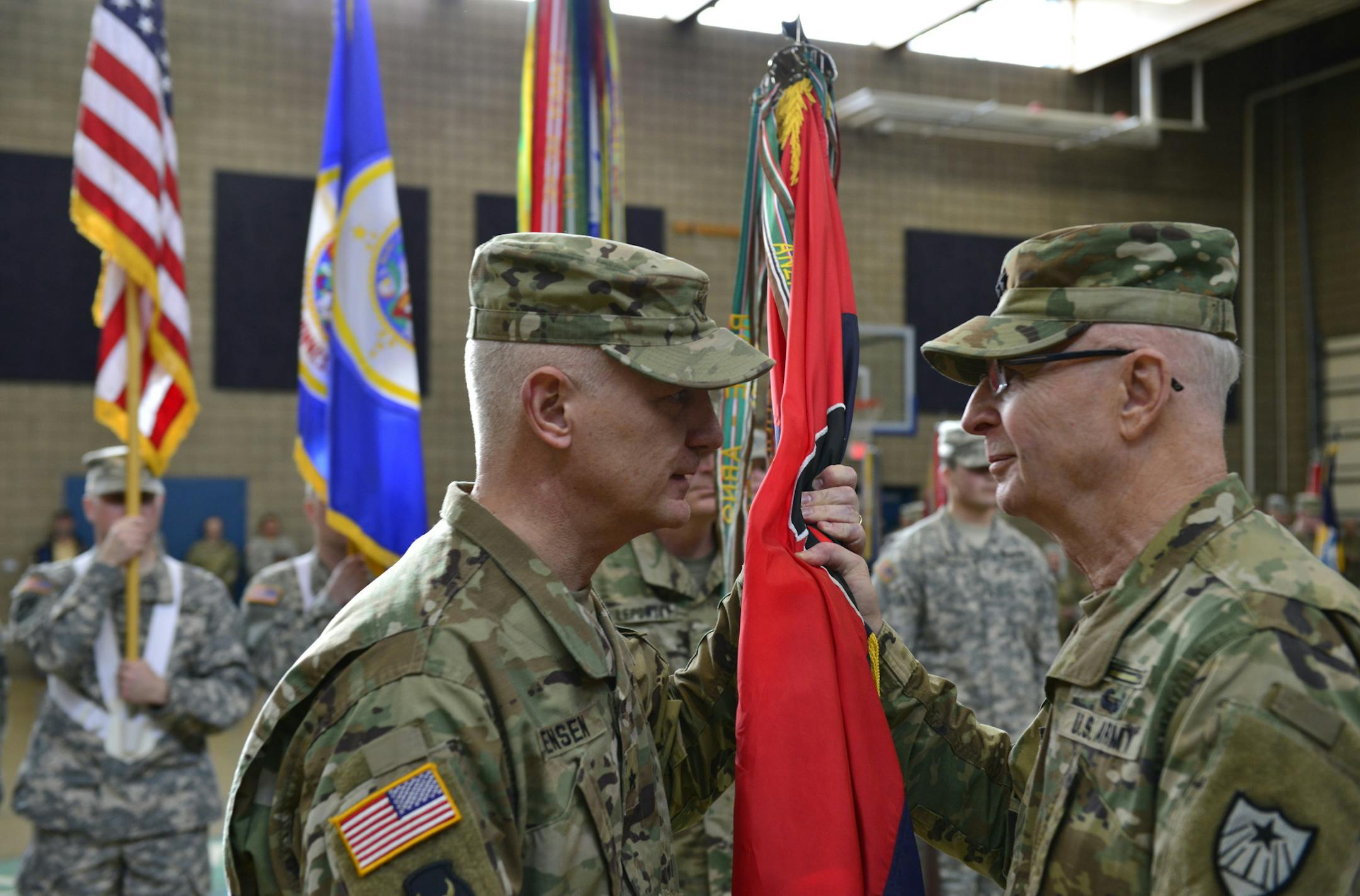 Brig. Gen. Jon Jensen took command of the Minnesota National Guard's 34th Red Bull Infantry Division from Maj. Gen. Neal Loidolt during a change of command ceremony, Jan. 7, 2017, in Rosemount. (Minnesota National Guard photo by Sgt. Luther Talks)