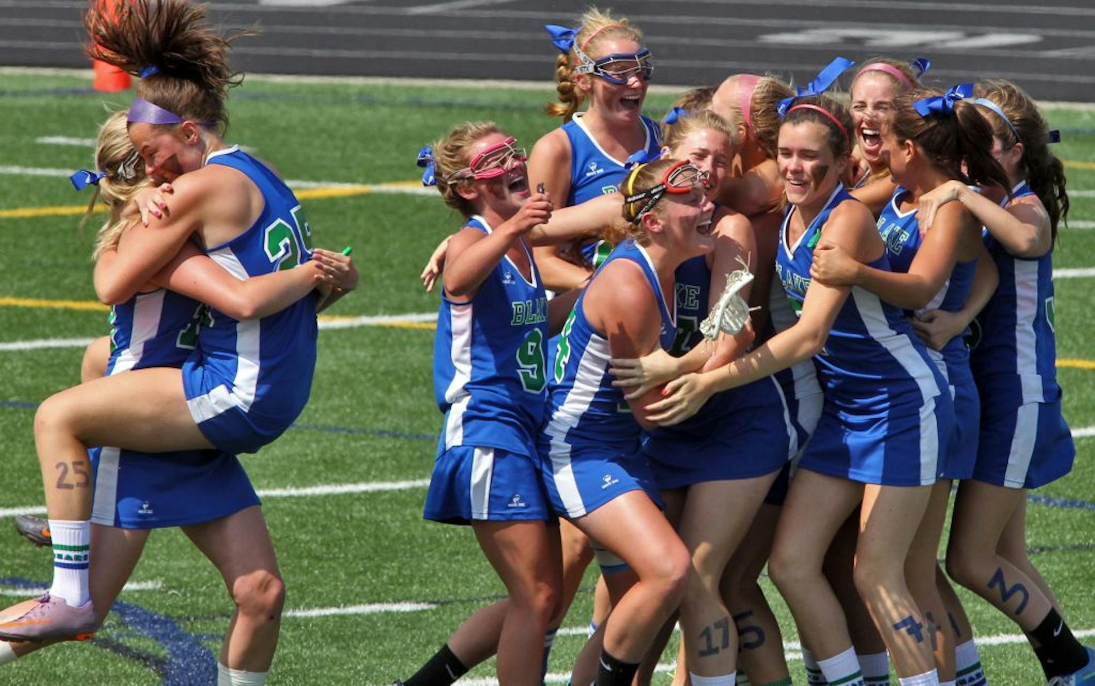 State high school girls lacrosse finals. The Blake school defeated Eden Prairie for the championship. (MARLIN LEVISON/STARTRIBUNE(mlevison@startribune.com (cq program )State high school girls lacrosse finals. The Blake school defeated Eden Prairie for the championship. Blake players celebrated their victory at the final horn. (MARLIN LEVISON/STARTRIBUNE(mlevison@startribune.com