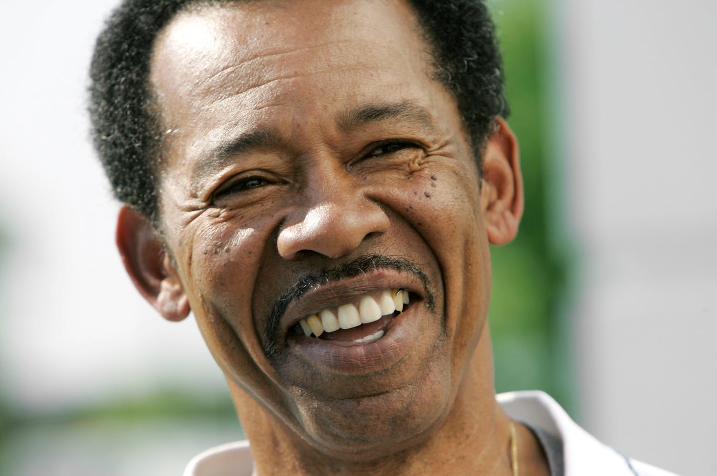 Charlie Sanders smiles during football training camp in Allen Park, Mich., Monday, July 30, 2007. Sanders, a former Gophers standout, was inducted into the Pro Football Hall of Fame that summer. He died Thursday.