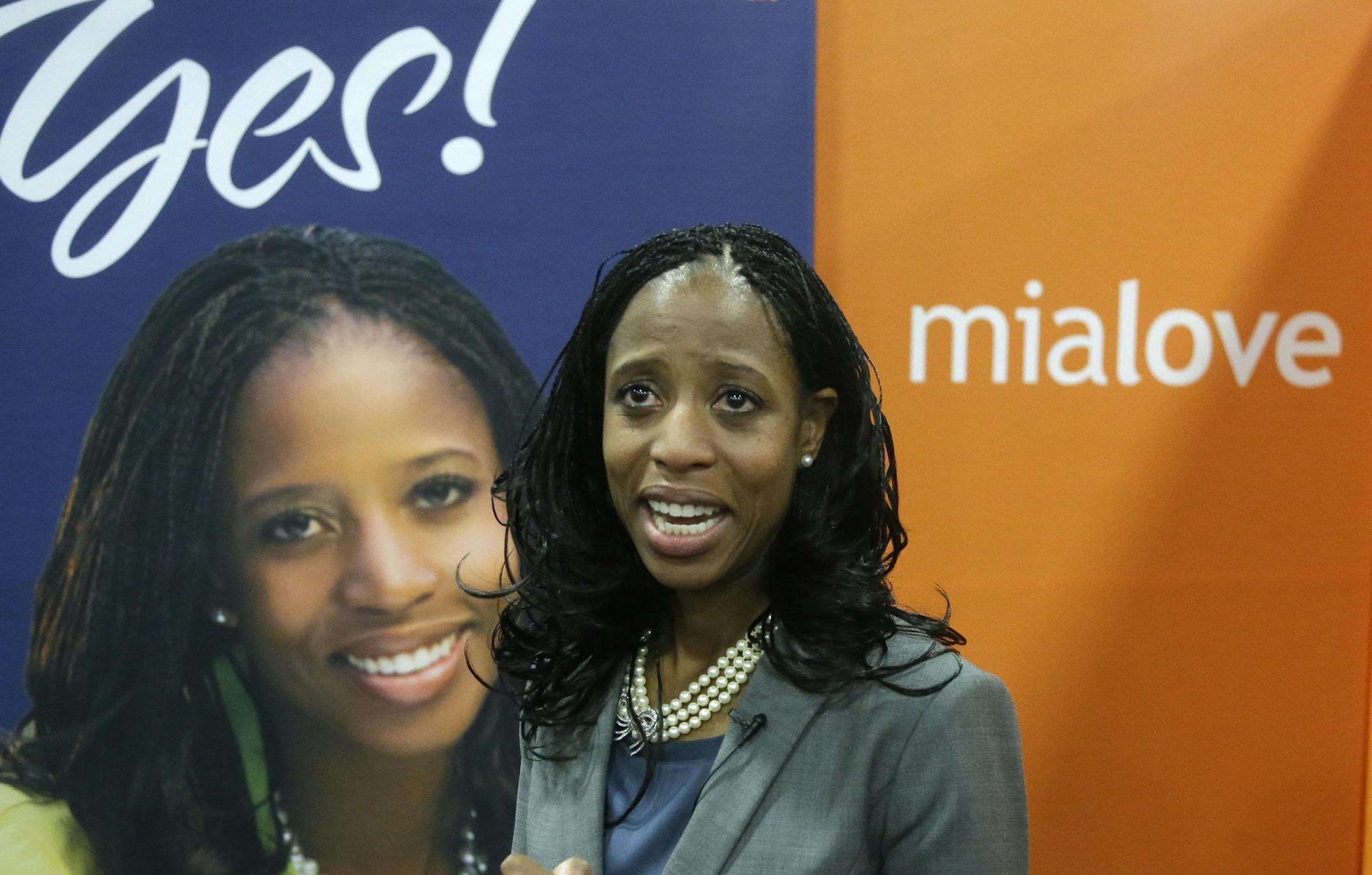 Republican congressional candidate Mia Love speaks to the media after locking in the GOP nod as 4th District candidate during the Utah Republican Party nominating convention Saturday, April 26, 2014, in Sandy, Utah. Love secured the Republican nomination in her repeat bid to replace Democrat Jim Matheson in Congress. (AP Photo/Rick Bowmer)
