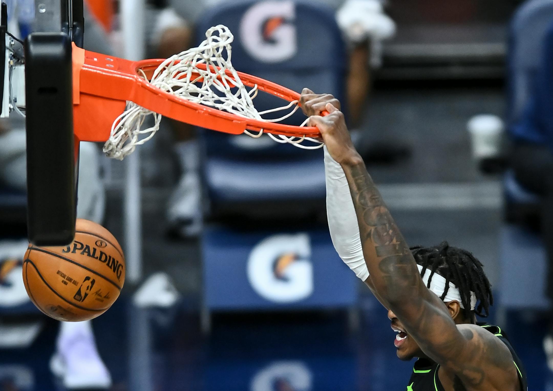 Minnesota Timberwolves forward Jarred Vanderbilt (8) dunked the ball in the second half against the Dallas Mavericks.