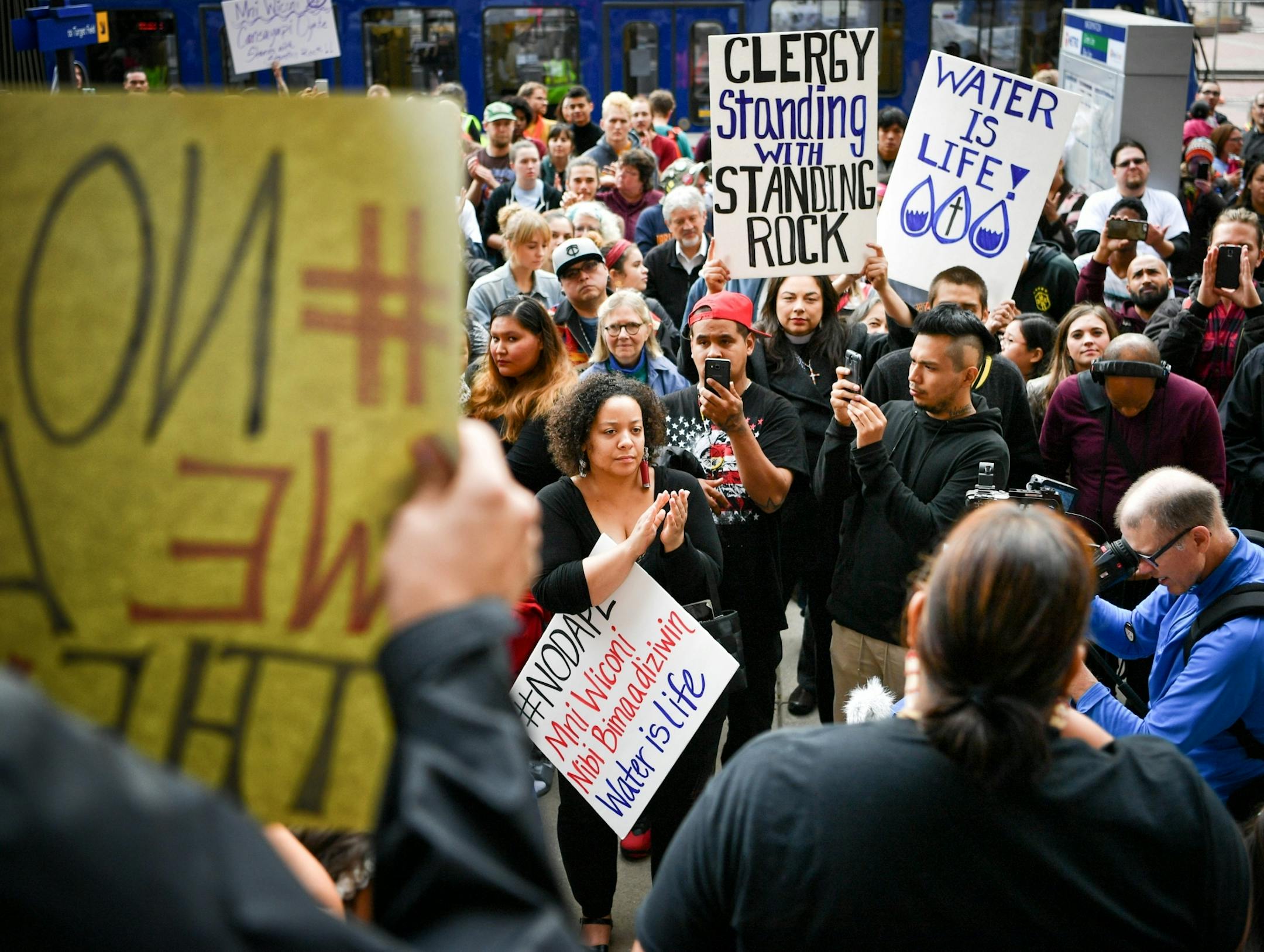 Protesters outside Minneapolis City Hall were angered that Hennepin County Sheriff deputies were participating in Standing Rock where Native People are fighting the pipeline.