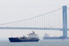 A chemical and oil products ship enters New York Harbor, Wednesday, June 3, 2015. The U.S. trade deficit declined sharply in April as exports posted a