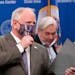 Gov. Tim Walz wore a mask in and out of a news conference on April 22, 2020. His decision on a statewide mask mandate could come in a matter of days.