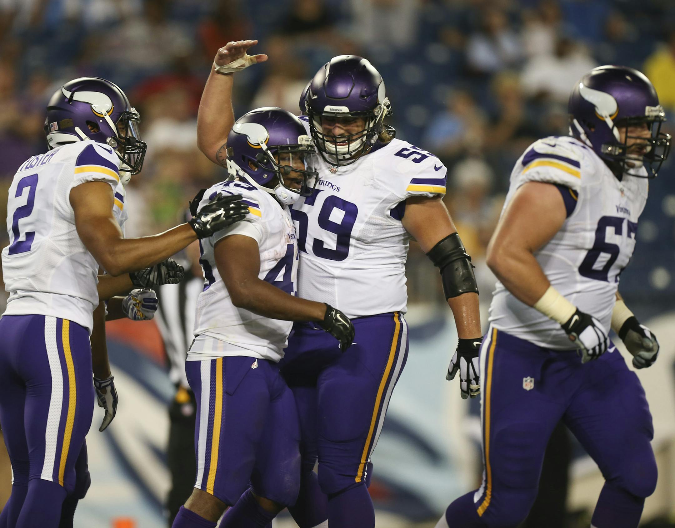 Vikings running back Dominique Williams (43) was congratulated by teammates Casey Matthews (59) and Donte Foster (2) after his 14 yard touchdown reception in the third quarter Thursday night. ] JEFF WHEELER ï jeff.wheeler@startribune.com The Minnesota Vikings lost to the Tennessee Titans 24-17 in their final preseason game Thursday night, September 3, 2015 at Nissan Stadium in Nashville, TN.