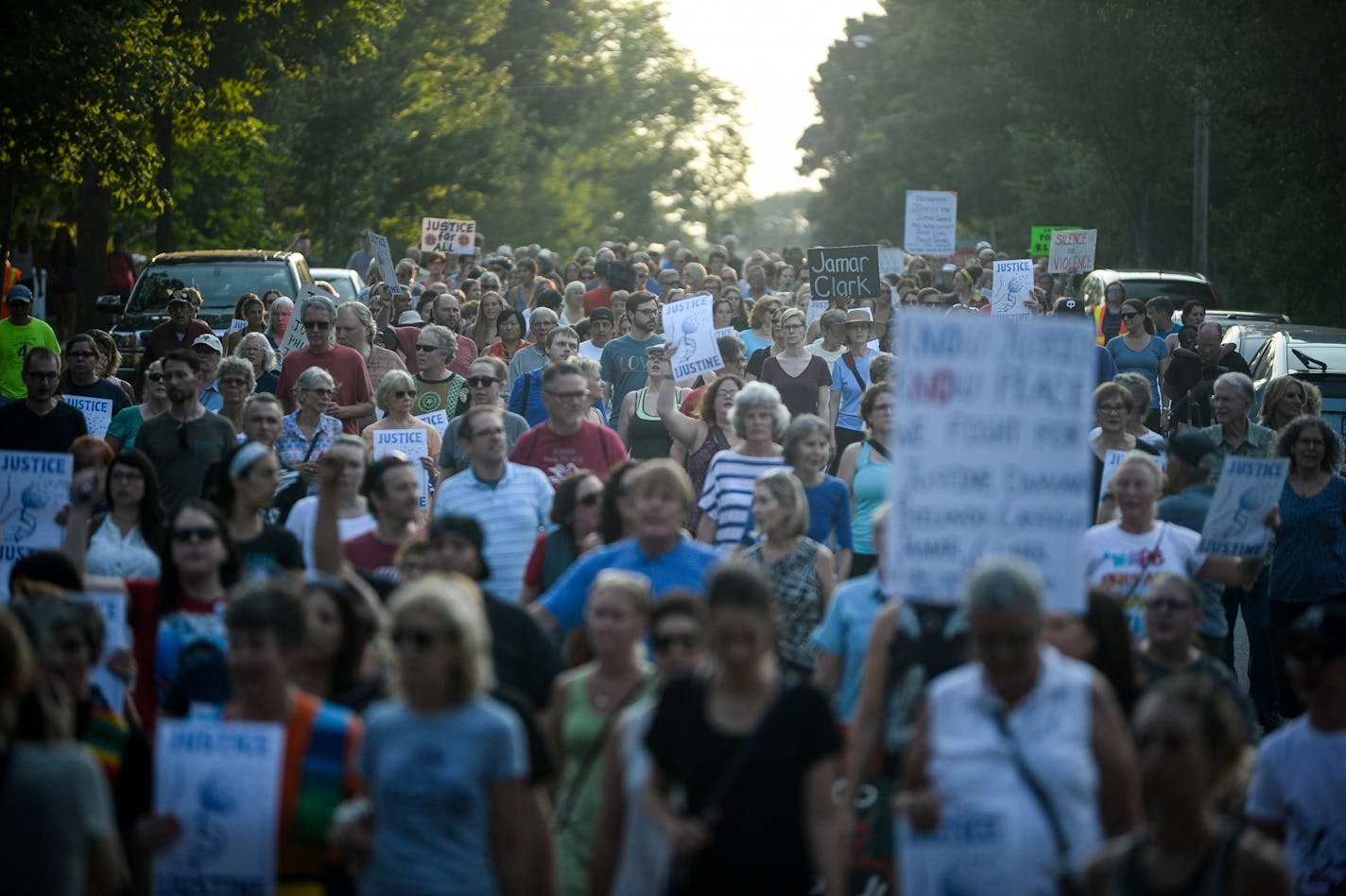 Hundreds marched from the site of Justine Damond's shooting to Beard's Plaissance Park during the Peace and Justice March for Justine Thursday night.