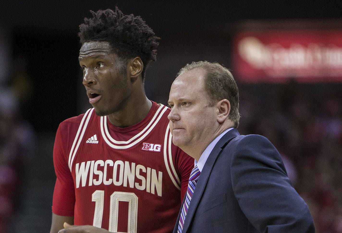 10 February 2016: Wisconsin Badgers forward Nigel Hayes (10) talks with Wisconsin Badgers intern head coach Greg Gard during a break in action as the Wisconsin Badgers defeat the Nebraska Cornhuskers (72-61) at the Kohl Center in Madison, WI. (Photo by Dan Sanger/Icon Sportswire) (Icon Sportswire via AP Images) ORG XMIT: 258340