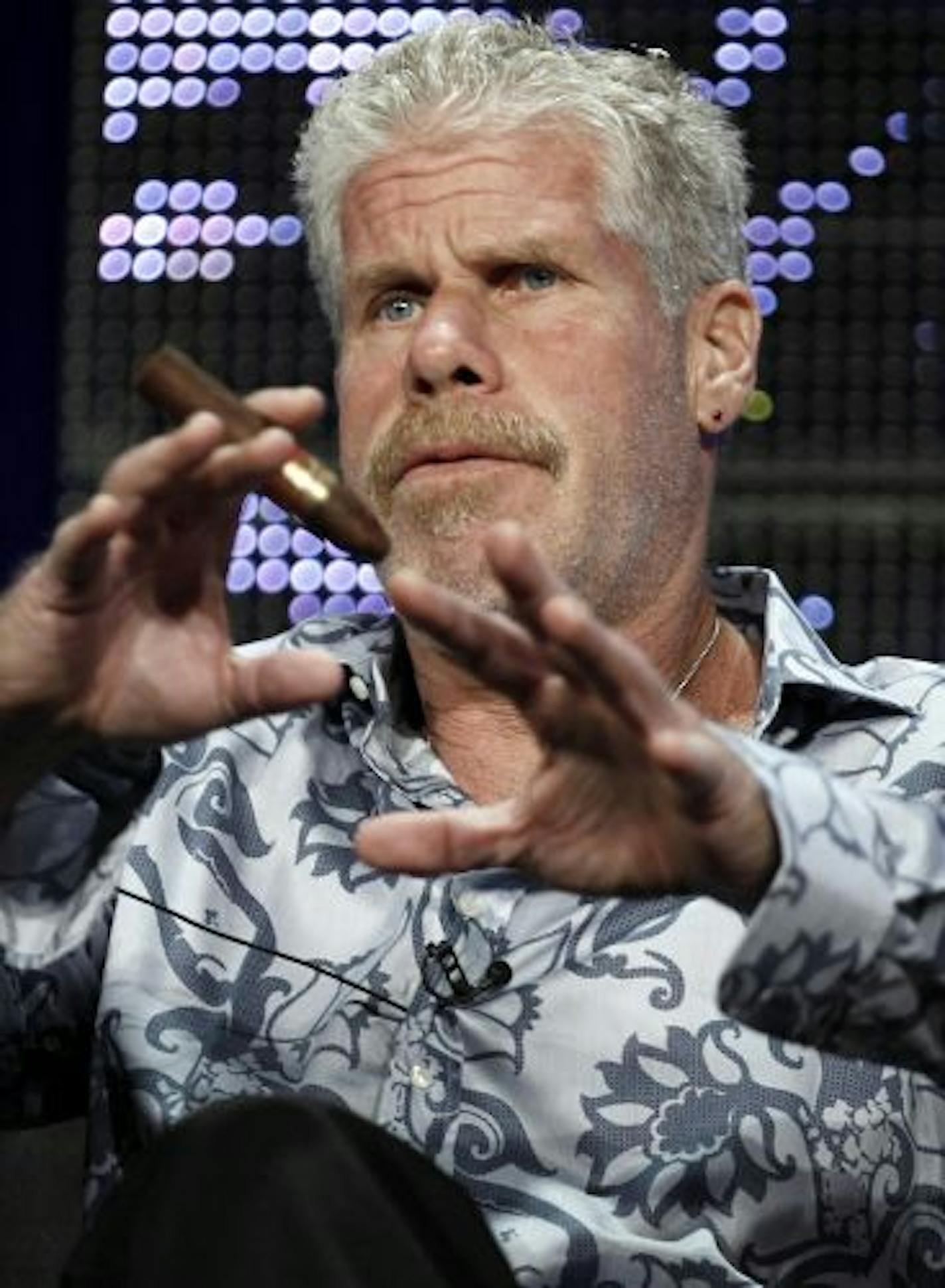 Actor Ron Perlman, with his favorite cigar -- a Joya de Nicaragua -- during a Television Critics Association panel discussion this summer.