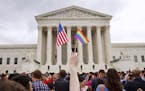 FILE - In this June 26, 2015, file photo, a crowd celebrates outside of the Supreme Court in Washington after the court declared that same-sex couples