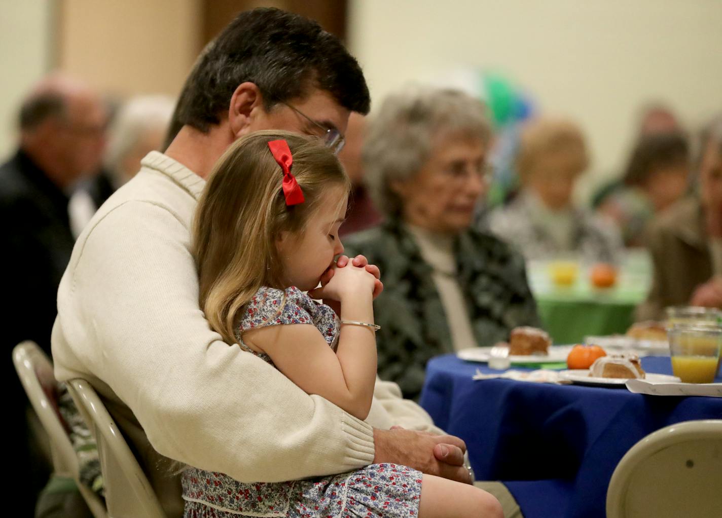 Keilana Sjostrom prayed with her grandfather Dave Karel during a ceremony called &#x201c;Honoring the Past, Preparing for the Future&#x201d; at LifePoint this month.