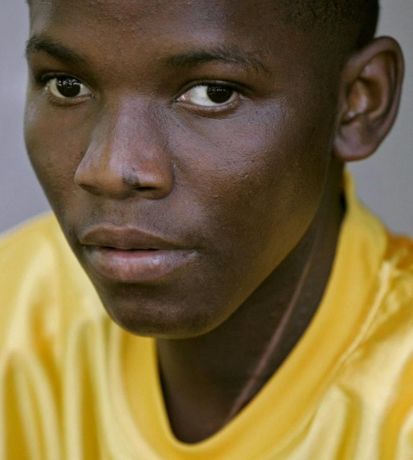 Blama Massaquoi was 19 years old in this Star Tribune photo. He survived torture and after surgeons in Minnesota repaired some of the damage, he dedicated his life to helping others. Kyndell Harkness/Star Tribune