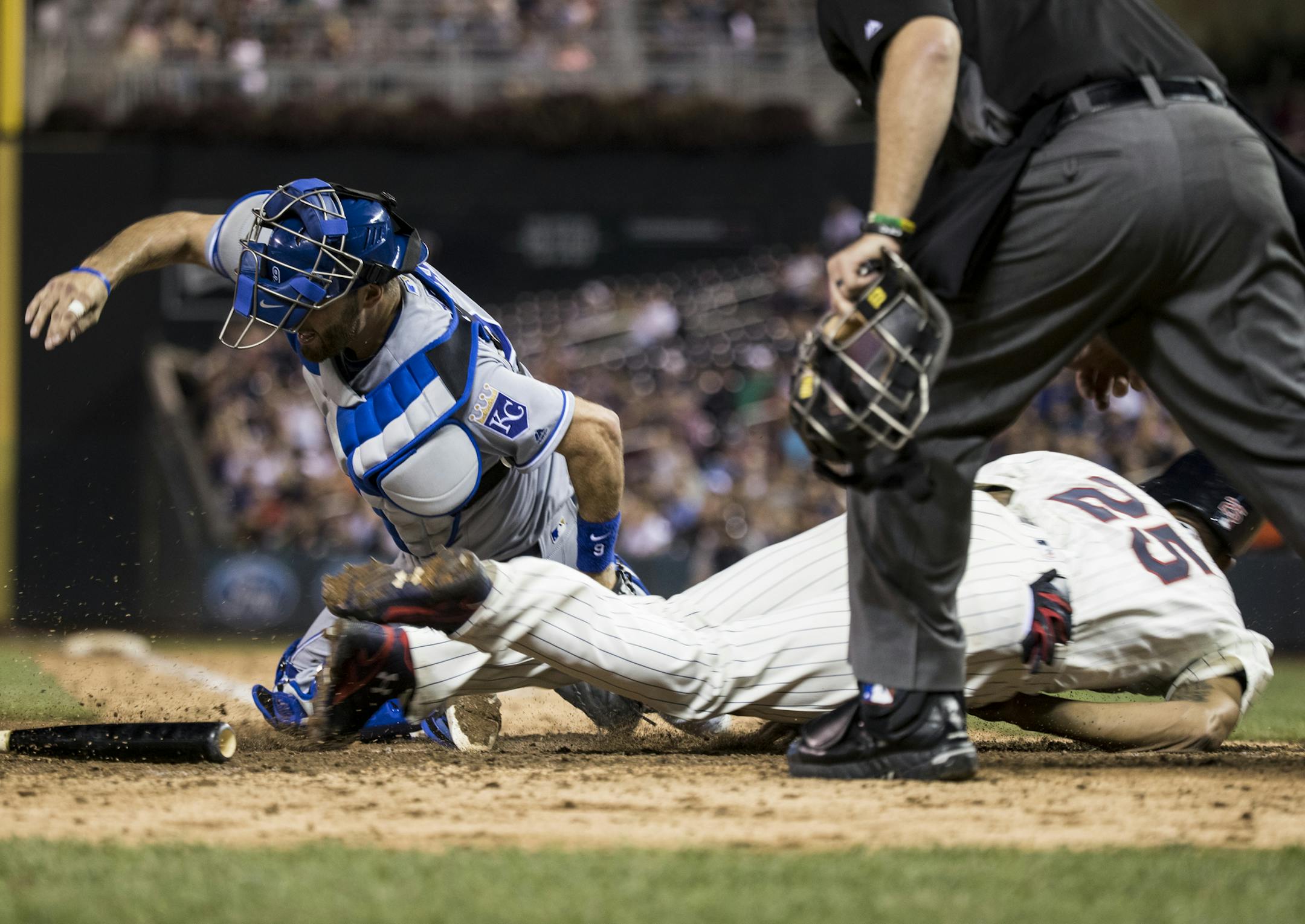 Twins Byron Buxton slid safely into home against Kansas City's Drew Butera in the bottom of the fifth inning. ] RENEE JONES SCHNEIDER • renee.jones@startribune.com The Twins hosted the Kansas City Royals at Target Field in Minneapolis, Minn. on Wednesday, September 7, 2016.
